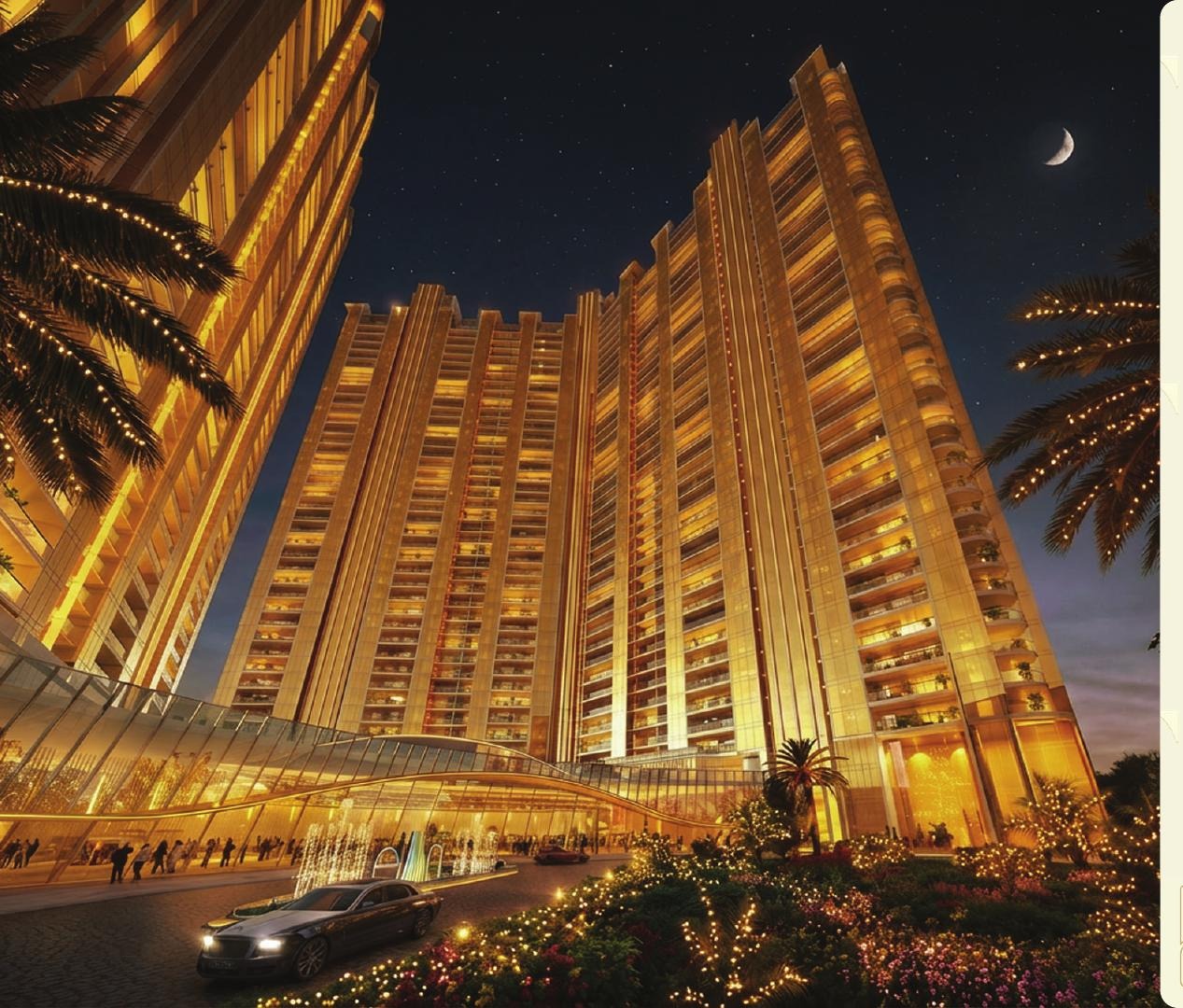 Elan The Statement towers illuminated at night